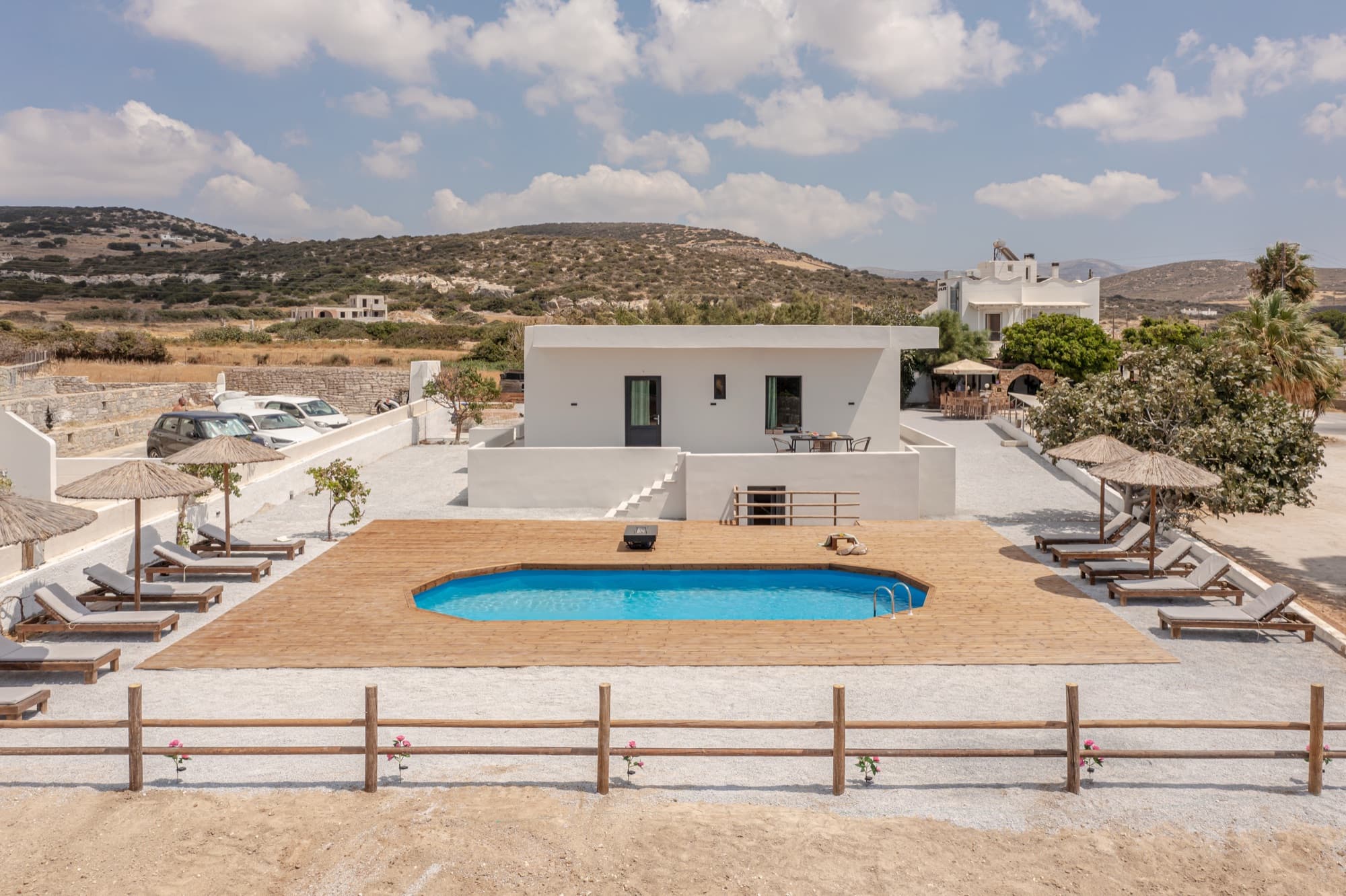 Villa Eira exterior with private pool and Naxian hills