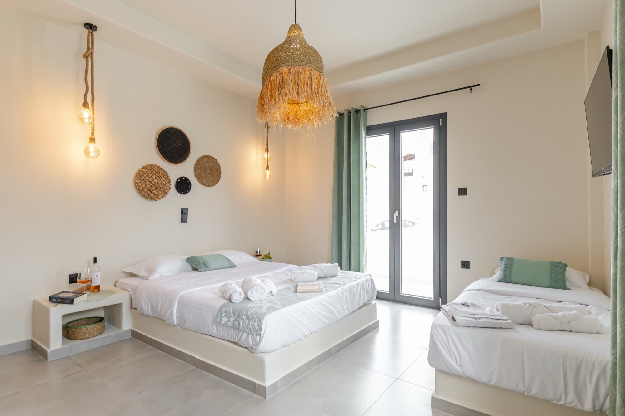 Bedroom with double bed, single daybed and balcony access